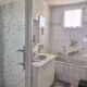 Maison mitoyenne de 137 m² total avec 4 chambres et garage à Guénange (F-57)