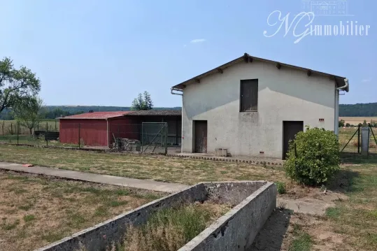 Terrain plat 855m2 DOULCON